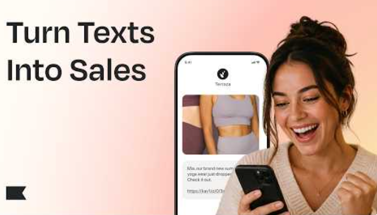 Smiling woman looking excitedly at her phone displaying a text message marketing yoga wear, with the text "Turn Texts Into Sales" on the left.