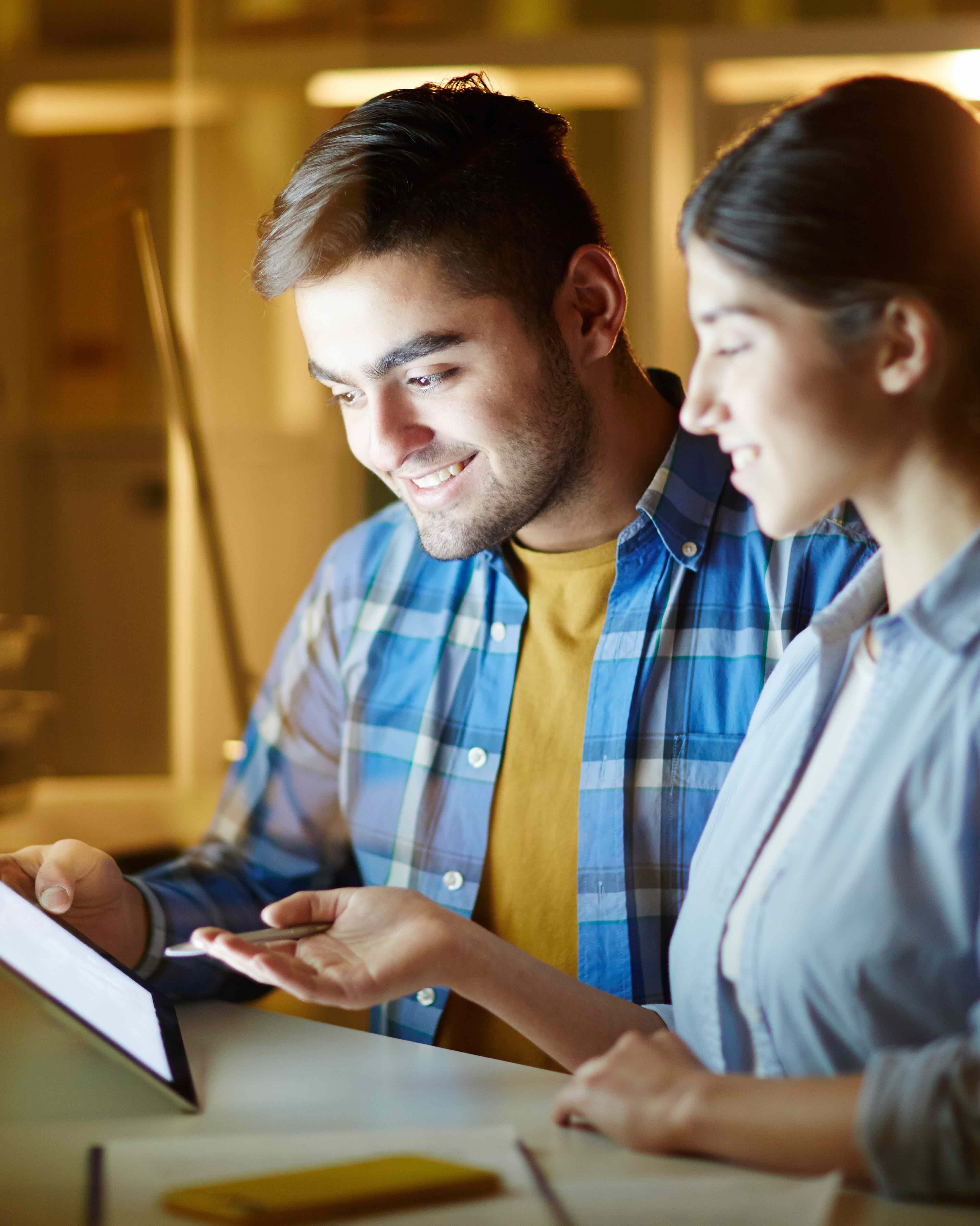 Two team members working together on a project.