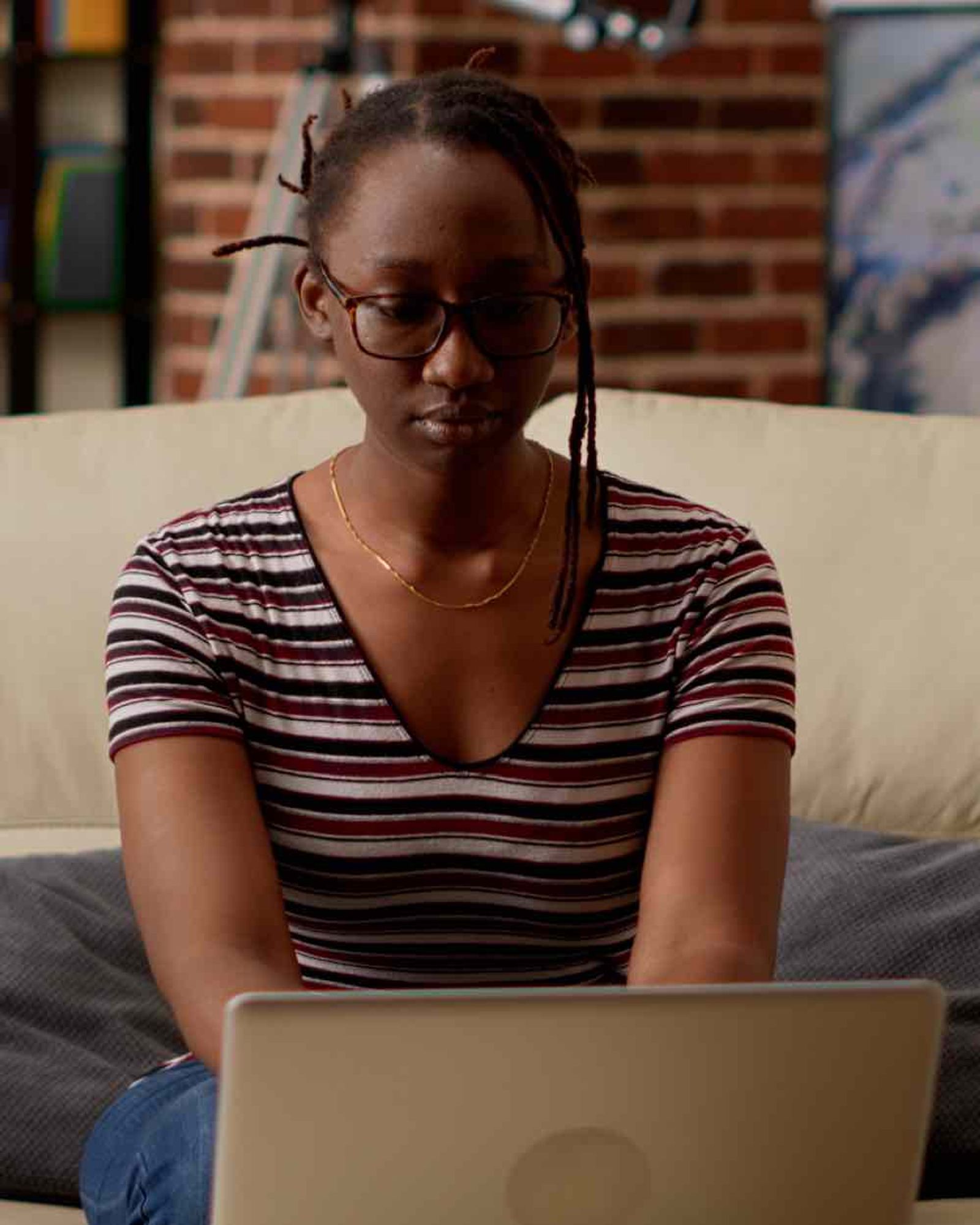 Woman looking at computer.