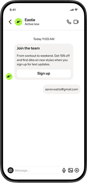 A phone screen displays a text message from "Eastie" promoting 15% off for text updates, and a user response "aaron.watts@gmail.com".