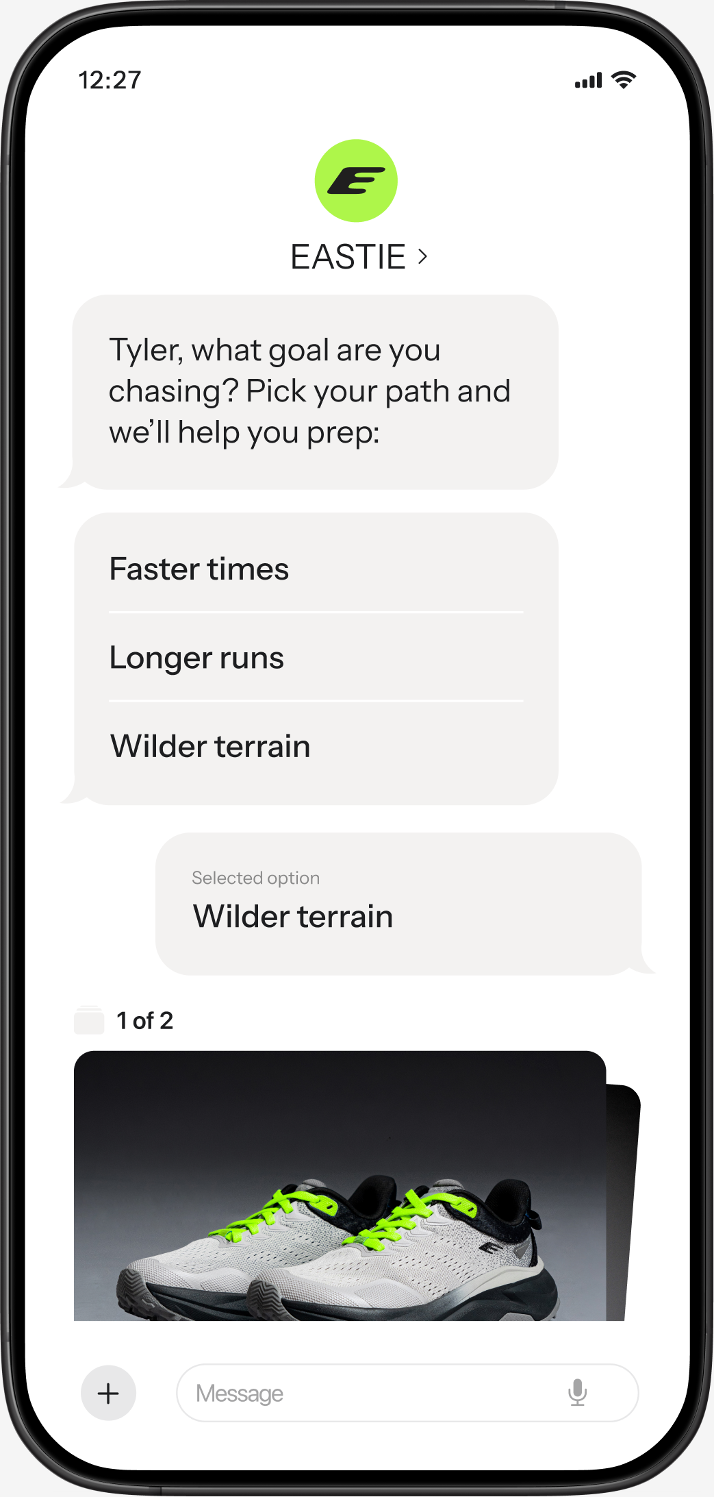 A phone screen displaying a chat where "Wilder terrain" is selected as a running goal, with an image of grey and black trail running shoes with bright green laces shown below.