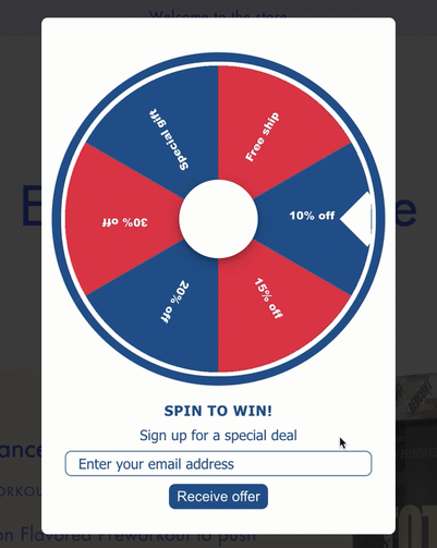 Video showing a site visitor entering their email and then submitting it to spin the wheel on a spin to win form.