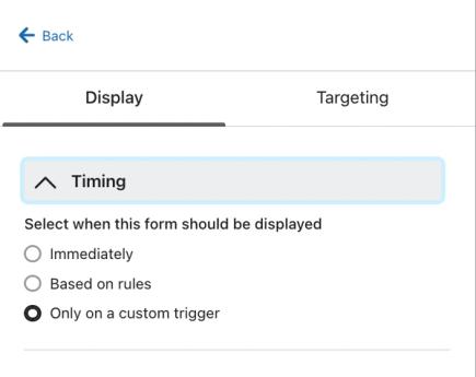 The Timing section of the Targeting and behaviors tab in the form editor showing the option to Show on a custom trigger selected.