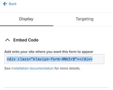 An example form's embed code highlighted to copy from the Display menu within the Targeting and behaviors tab of the form editor.