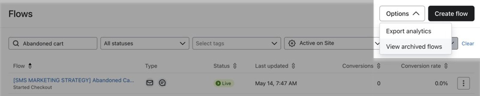 Options dropdown in the top right of the Flows tab with the option 'View Archived Flows' selected.