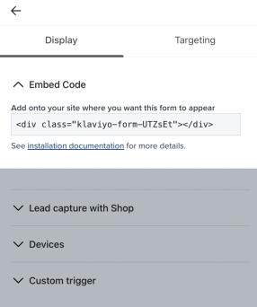 An example form's embed code being copied from within the display menu in the form editor.
