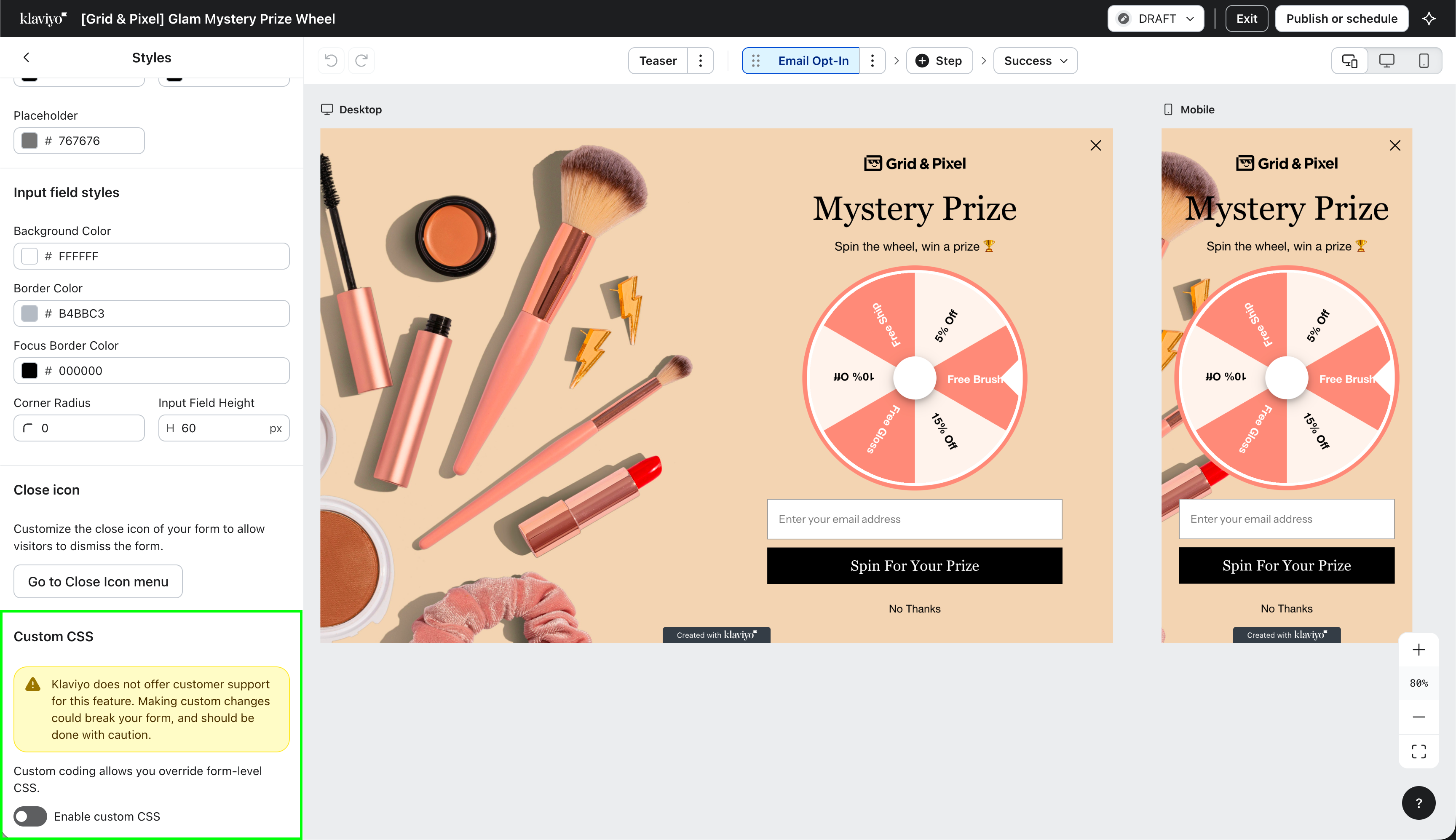 Editor for a makeup-themed "Mystery Prize Wheel" popup, with style settings including a highlighted "Custom CSS" section on the left, and desktop and mobile previews on the right.