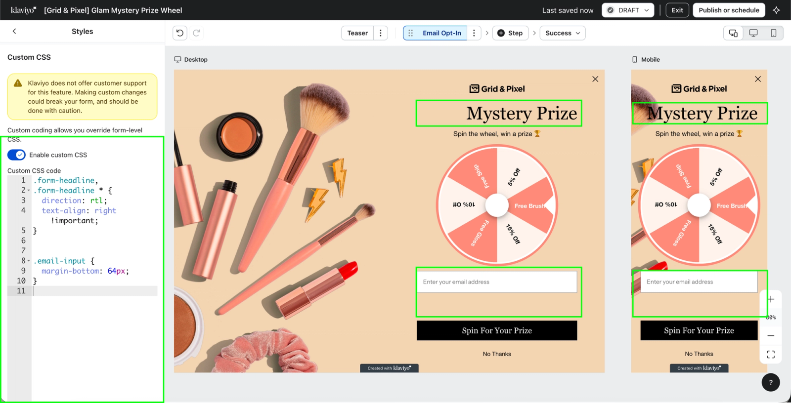 A web design interface showing custom CSS code and desktop and mobile previews of an email opt-in pop-up with a "Mystery Prize" spin wheel.