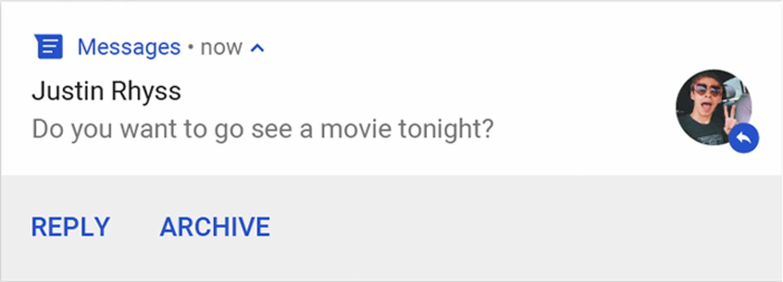 An Android notification with Reply and Archive action buttons.