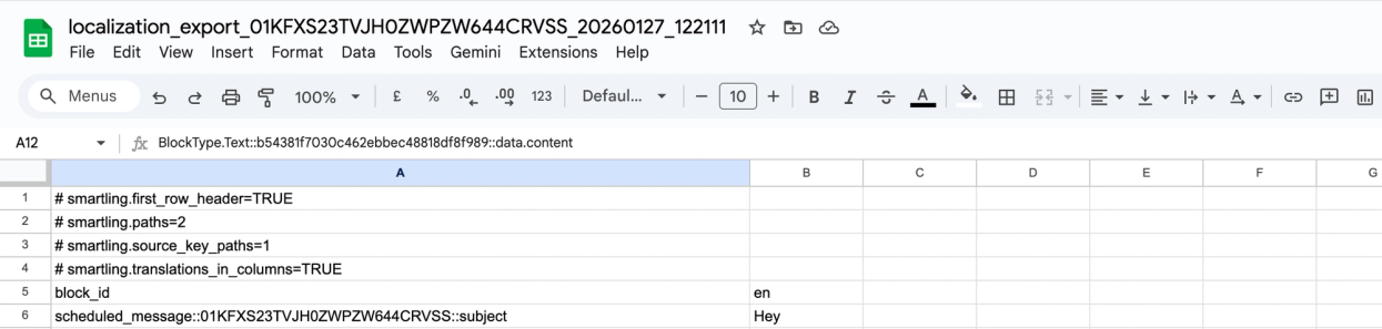 Sample translation CSV in Google sheets showing smartling directives, block_id, source language column code, for one row.