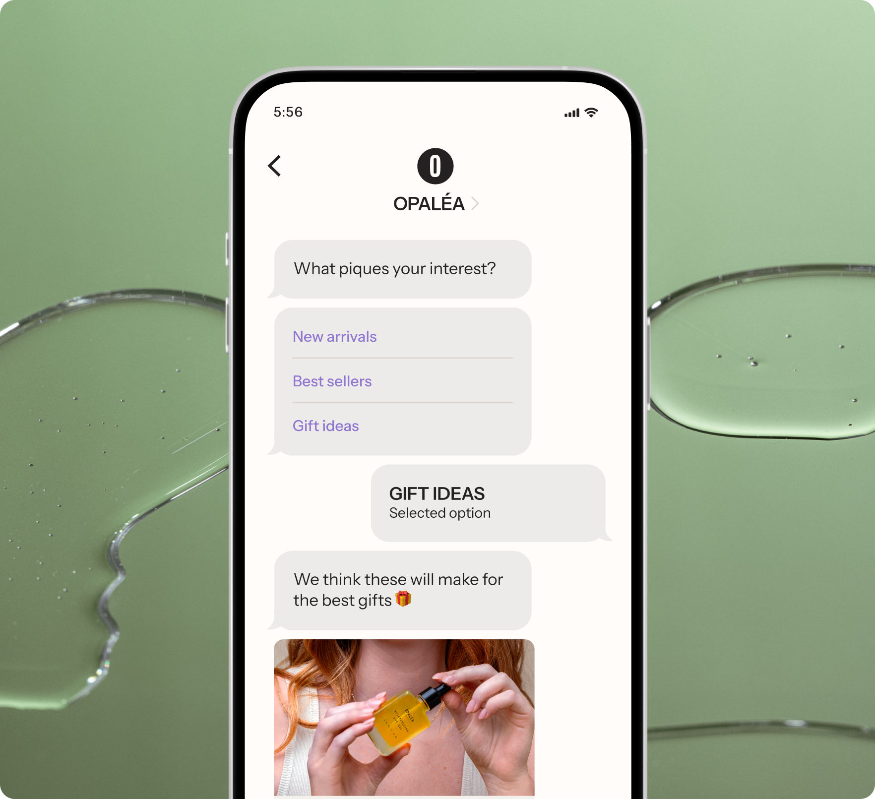 A smartphone displays the Opaléa app's chat, showing "Gift ideas" selected and a product photo, on a green background with clear liquid drops.