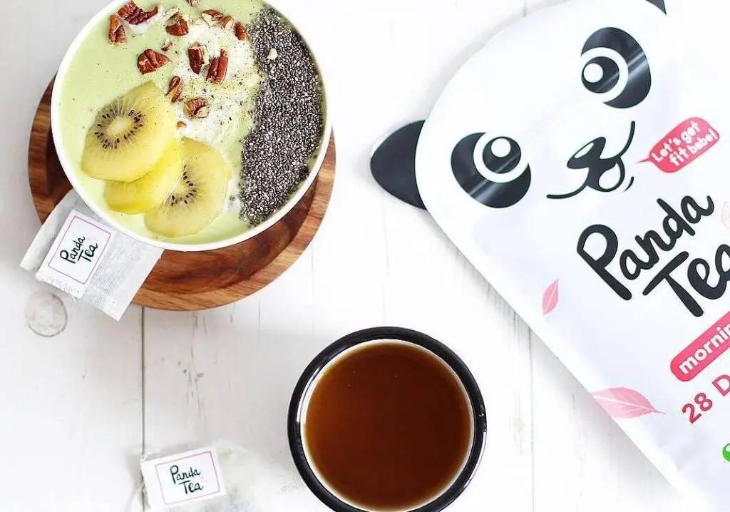Two mugs side by side filled with Panda Tea, next to a package of Panda Tea.