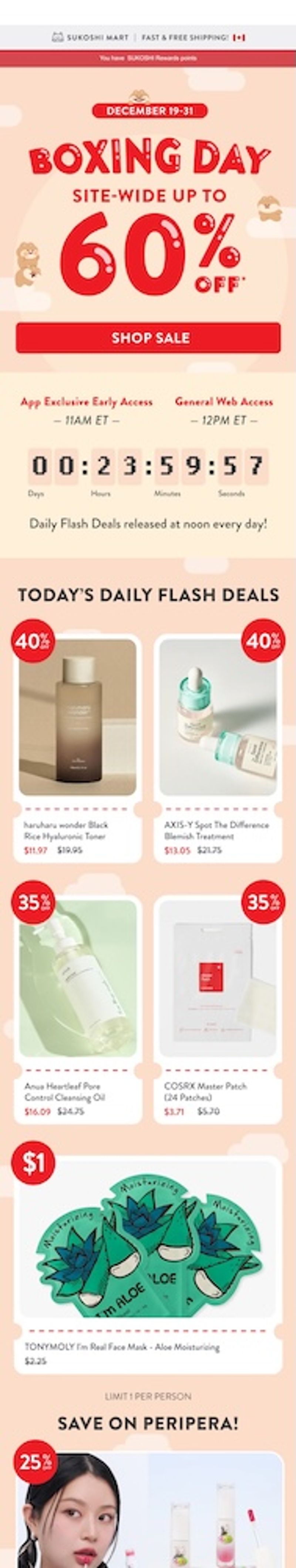 Image shows a Boxing Day marketing email from K-beauty lifestyle brand Sukoshi Mart, which uses bold red font on a peach-colored background to advertise a 60% Boxing Day sale. Beneath the “shop sale” CTA button is a section detailing when access begins for those in the app exclusive group vs. general access, with a countdown clock to the sale’s end. Below that are “today’s daily flash deals,” including a pen liner and lash serum at 25% off each.