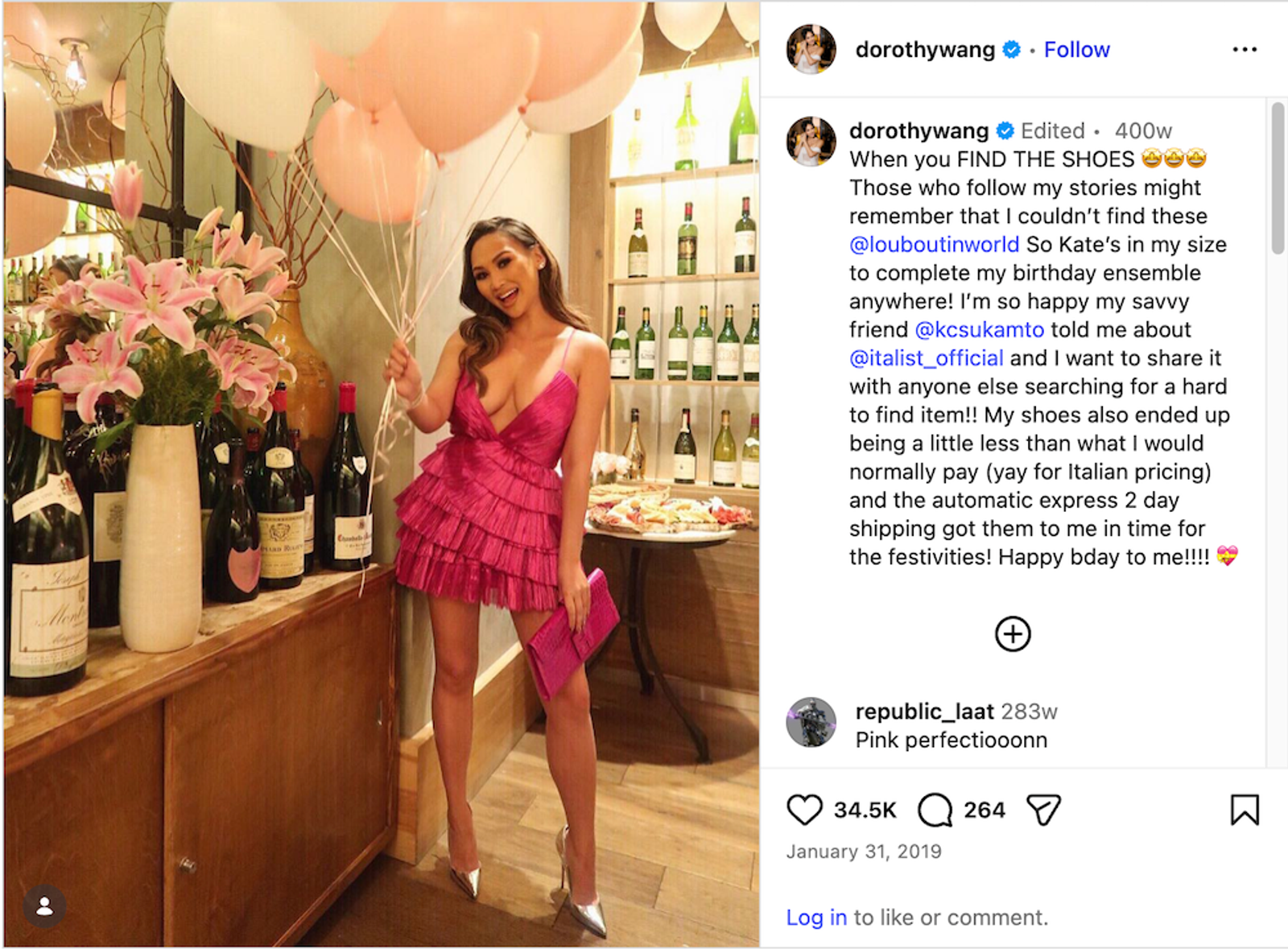 Dorothy Wang in a pink ruffled mini dress and silver heels, holding pink and white balloons and a pink clutch, in a wine bar setting.
