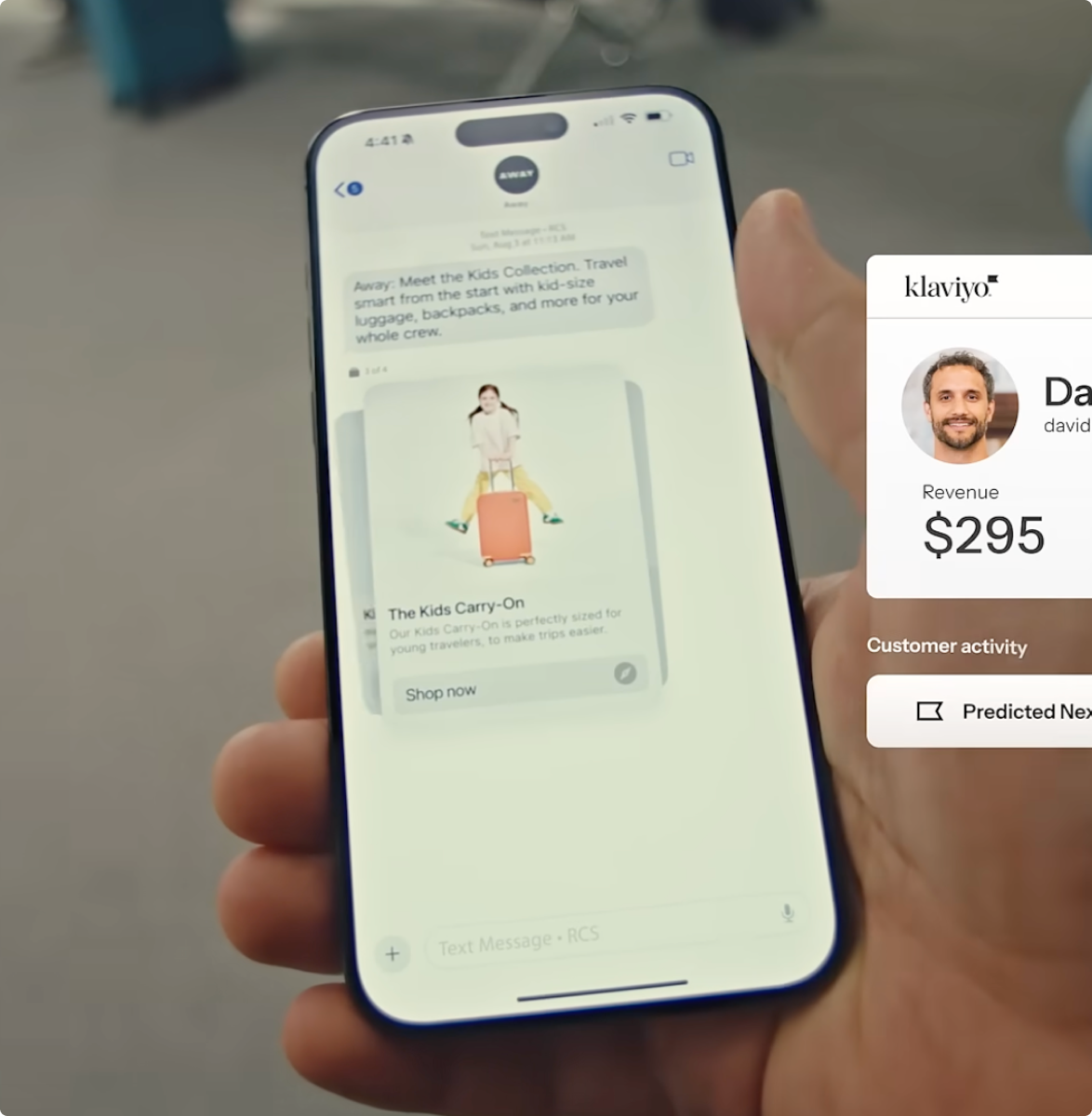 Smartphone displays an Away Kids Collection ad in a text message, alongside a Klaviyo panel with $295 customer revenue.