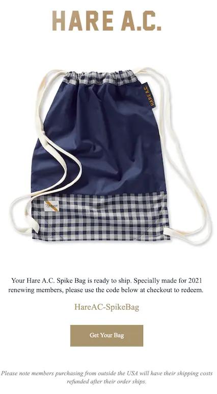 Image shows a successful email marketing campaign from athletic apparel brand Tracksmith. Under the headline “Hare AC” in gold font, the email shows a product image on a white background of a free spike bag for customers who purchase a membership. The CTA button reads, “Get your bag.”