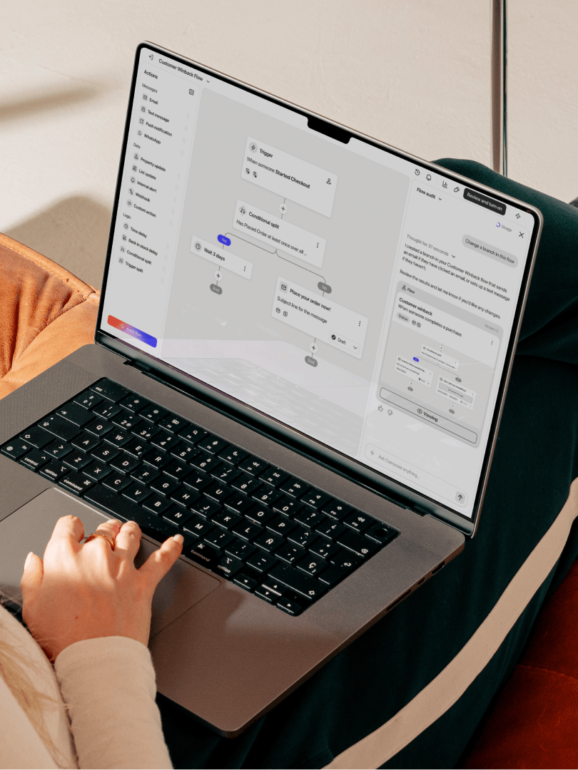 Person using a laptop to build an automated customer feedback workflow