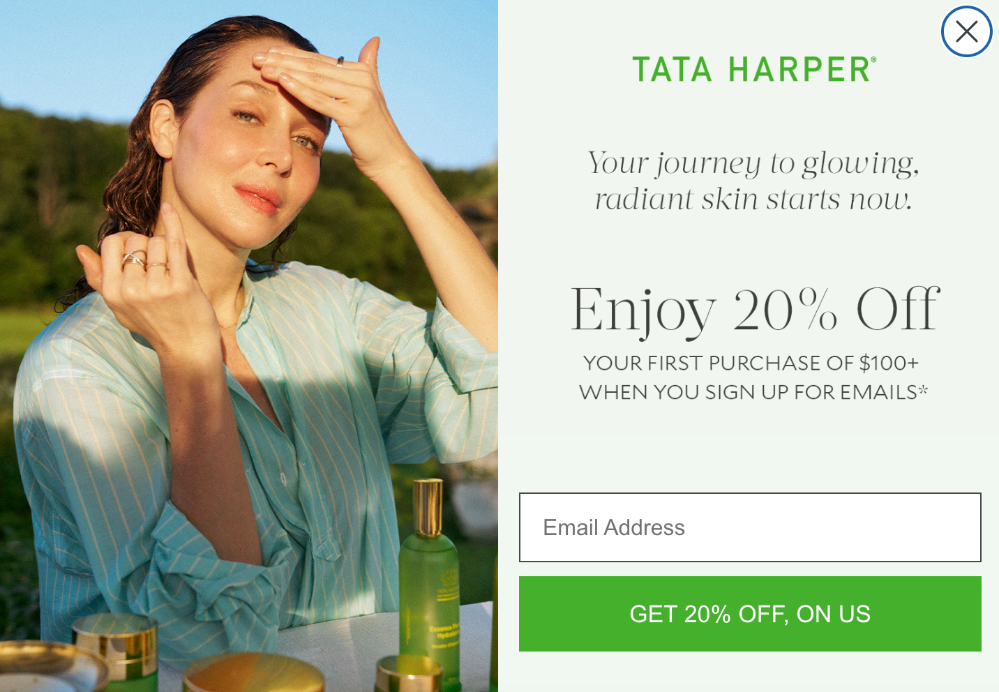 Tata Harper skincare popup featuring a radiant woman applying product and offering 20% off for email sign-up.