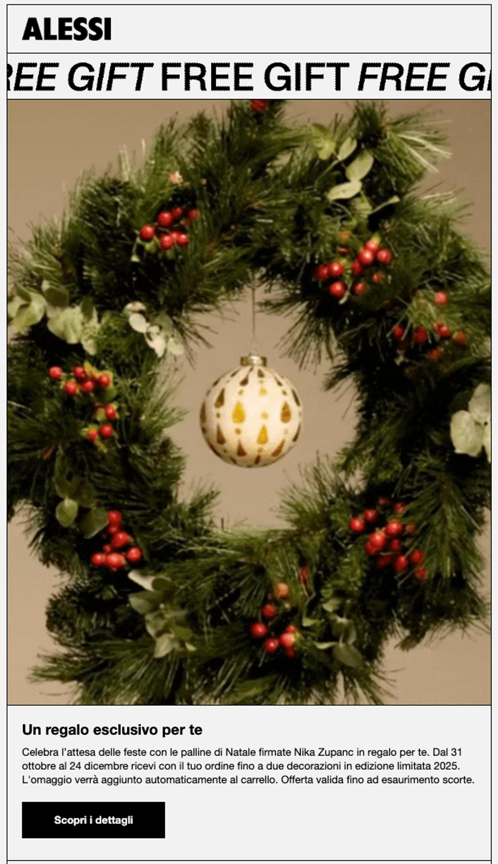 An Alessi promotional image featuring a lush green Christmas wreath decorated with clusters of red berries. In the center of the wreath hangs a cream-colored glass ornament with a gold teardrop pattern. Text in the image includes: Top Banner: "ALESSI" and a repeating "FREE GIFT" ticker. Body Text: "Un regalo esclusivo per te" (An exclusive gift for you), followed by details in Italian about a limited edition 2025 Christmas bauble designed by Nika Zupanc, available with orders from October 31 to December 24. Button: A black button at the bottom reads "Scopri i dettagli" (Discover the details).