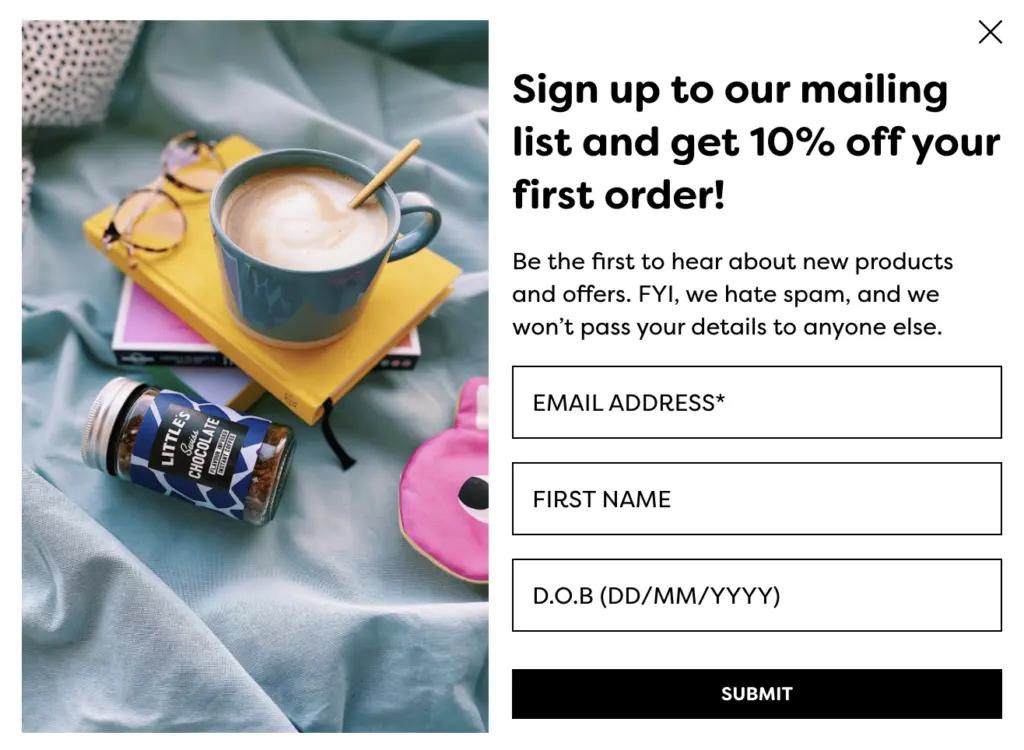 We Are Littles popup that promises subscribers will not be spammed and will get 10% off their first purchase with image of coffee cup.