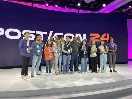 Photos of a group of Klaviyo employees accepting an award for Klaviyo's API.