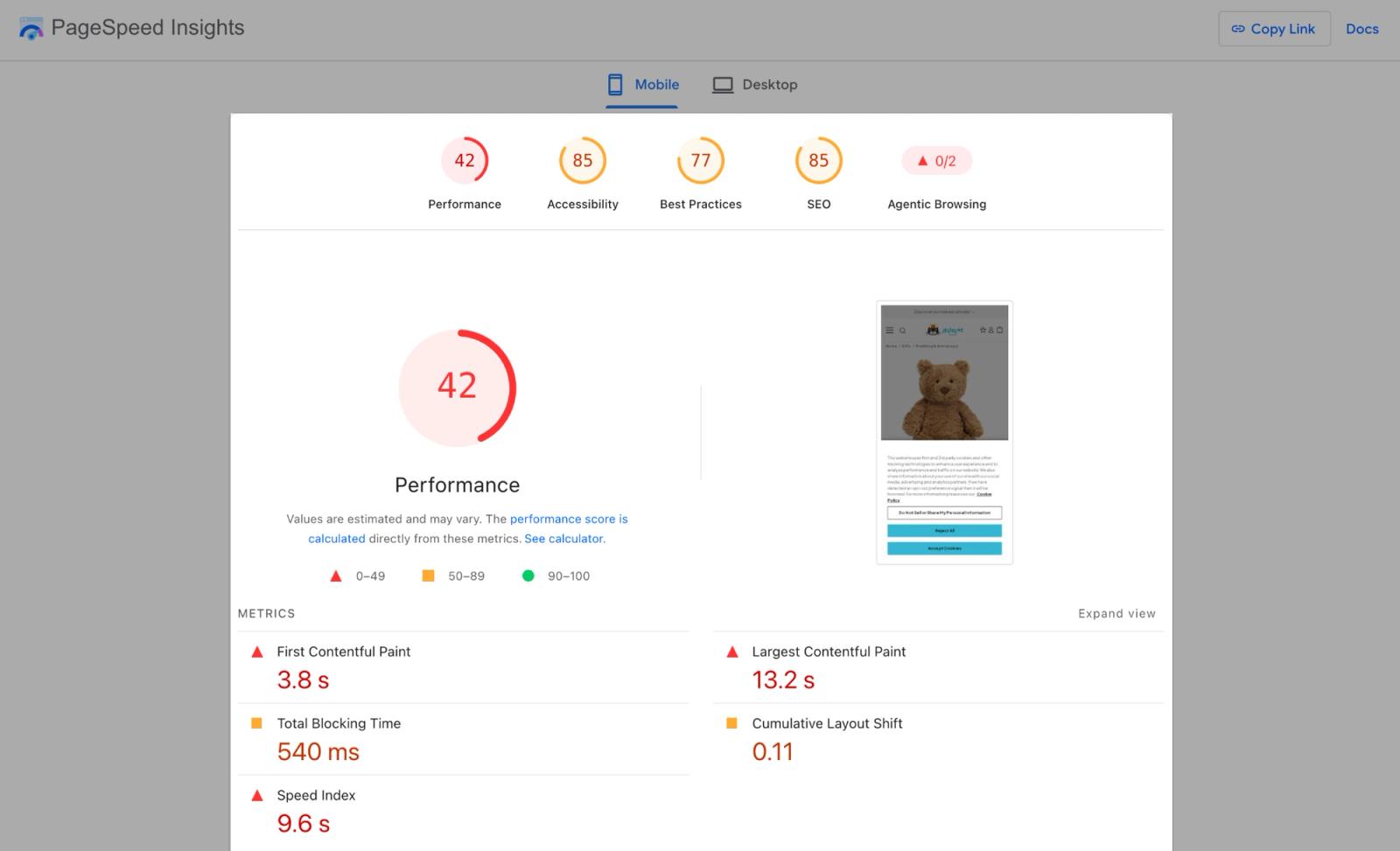 Image shows a PageSpeed Insights mobile report. 5 scores run across the top: “Performance: 42” in red, “Accessibility: 85,” “Best Practices: 77,” “SEO: 85,” and “Agentic Browsing: 0 of 2.” A large red dial repeats the Performance score of 42. A thumbnail on the right shows the product page tested, a soft toy behind a cookie consent banner. Metrics below read “First Contentful Paint 3.8 s,” “Largest Contentful Paint 13.2 s,” “Total Blocking Time 540 ms,” “Cumulative Layout Shift 0.11,” and “Speed Index 9.6 s.”