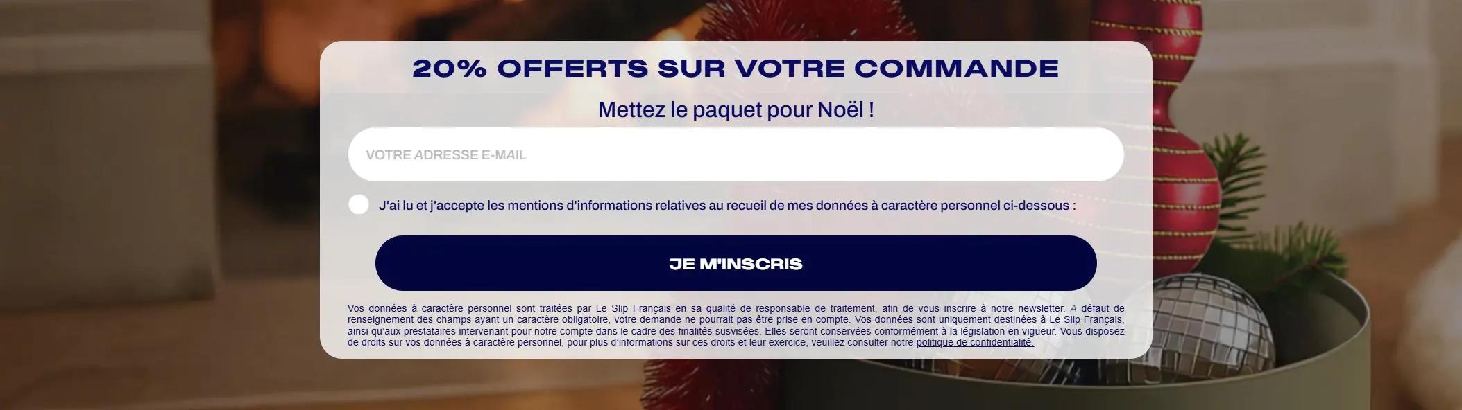 Formulaire d'inscription à la newsletter Le Slip Français avec offre de 20% sur commande, décorations de Noël en arrière-plan.