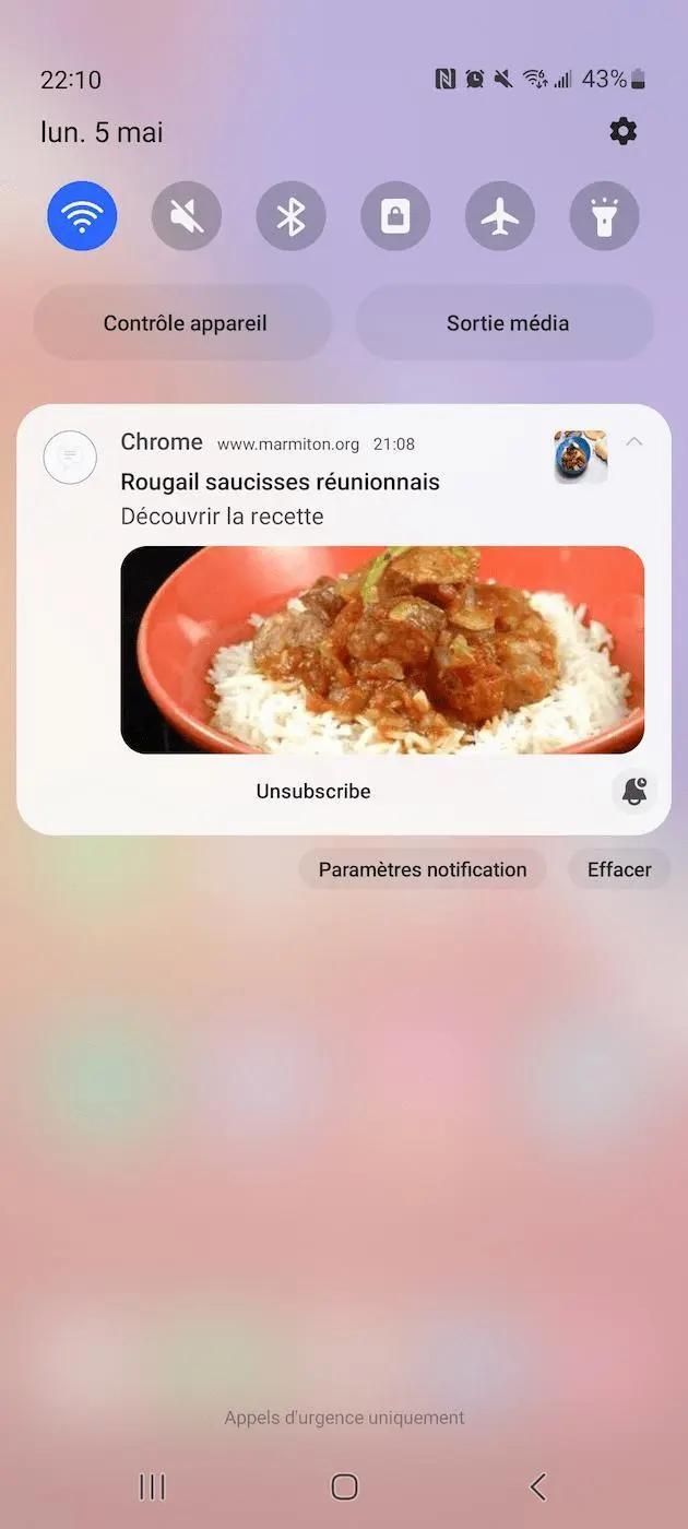 Notification push mobile affichant une recette de rougail saucisses avec visuel et lien (Marmiton.org)