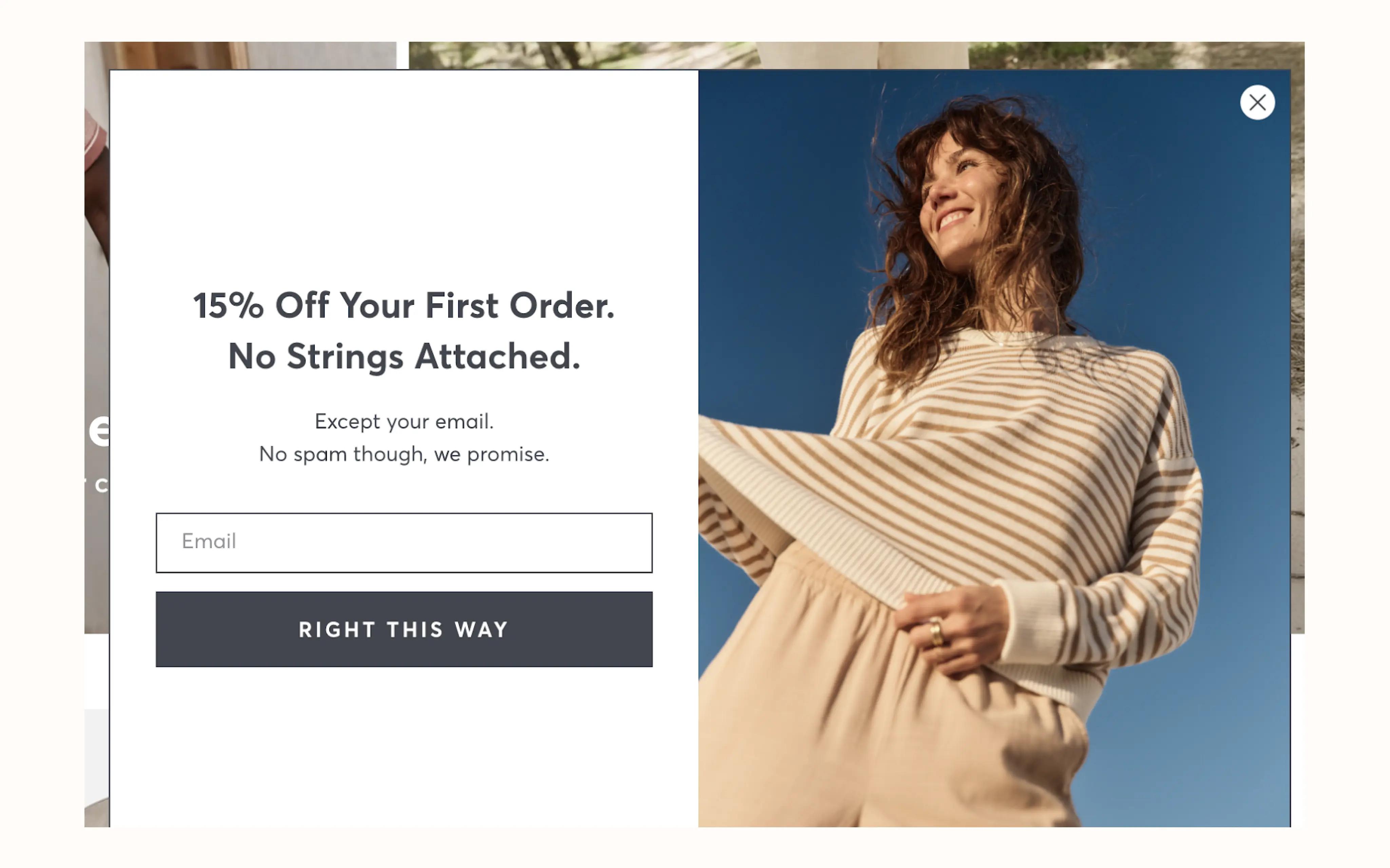 Image shows a sign-up form on the website of apparel brand Marine Layer, featuring an image of a model wearing the brand’s clothes, a 15% off order, and a field for inputting an email address.