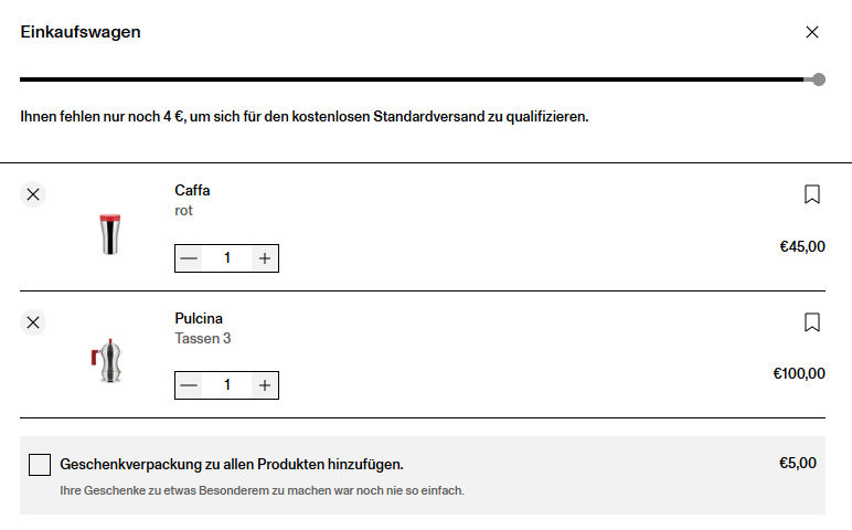 Shopping cart page titled “Einkaufswagen” showing a progress bar for free standard shipping with €4 remaining, two items listed—“Caffa” (red) priced at €45.00 and “Pulcina” (3-cup) priced at €100.00—with quantity controls, plus an optional gift wrapping add-on for €5.00.