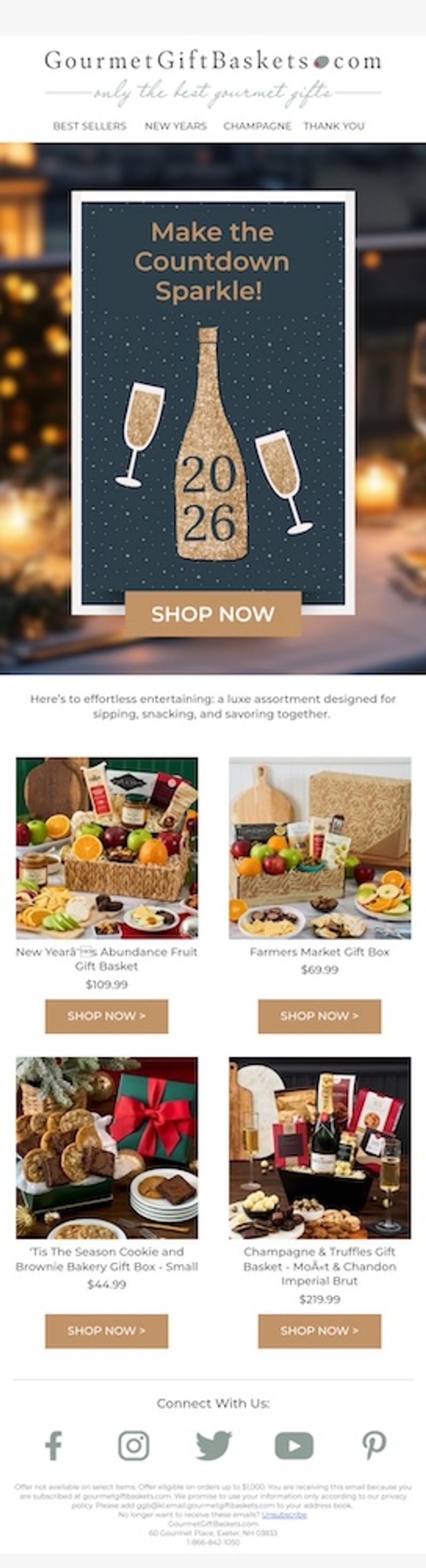 GourmetGiftBaskets.com New Year's email. Below the logo and a menu with bestsellers, New Year’s, champagne, and thank you links, the hero shows a navy card with gold glitter illustrations of a champagne bottle labeled "2026" and two champagne flutes, under the headline "Make the countdown sparkle!" and above a tan "Shop now" CTA button. The card sits against a blurred background of candles and string lights. The copy below reads, "Here's to effortless entertaining: a luxe assortment designed for sipping, snacking, and savoring together." A product grid follows, including a New Year's abundance fruit gift basket for $109.99, a farmers market gift box for $69.99, a cookie and brownie bakery gift box for $44.99, and a champagne and truffles gift basket with a bottle of Moët and Chandon Imperial Brut for $219.99, each with a "Shop now" CTA button.