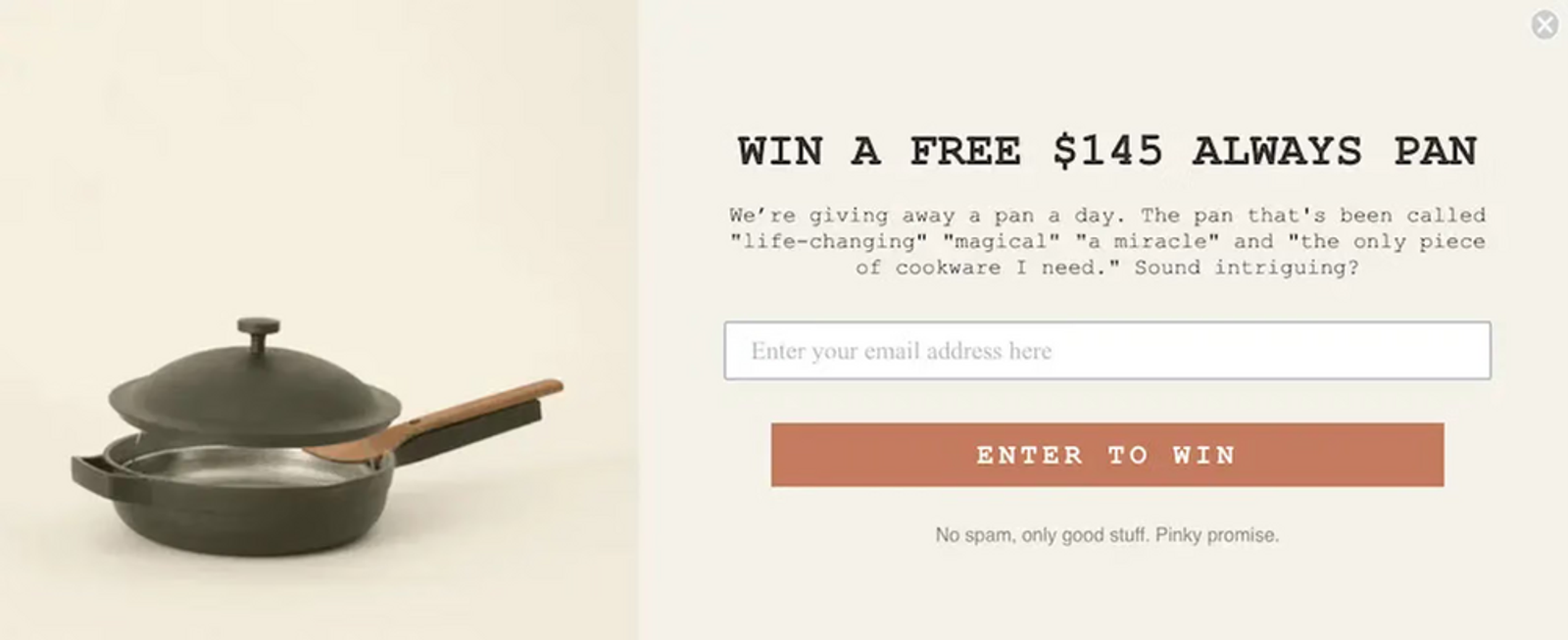 Image shows a sign-up form from Our Place offering new subscribers the chance to win a free pan. The form includes quotes from happy customers who’ve reviewed the brand’s products in a positive light. To the left of the form is a product shot of a dark gray cooking pan with a metal basket inside and a wooden spoon sitting on the pan’s handle. The top for the pan is hovering just over the pan in mid air.