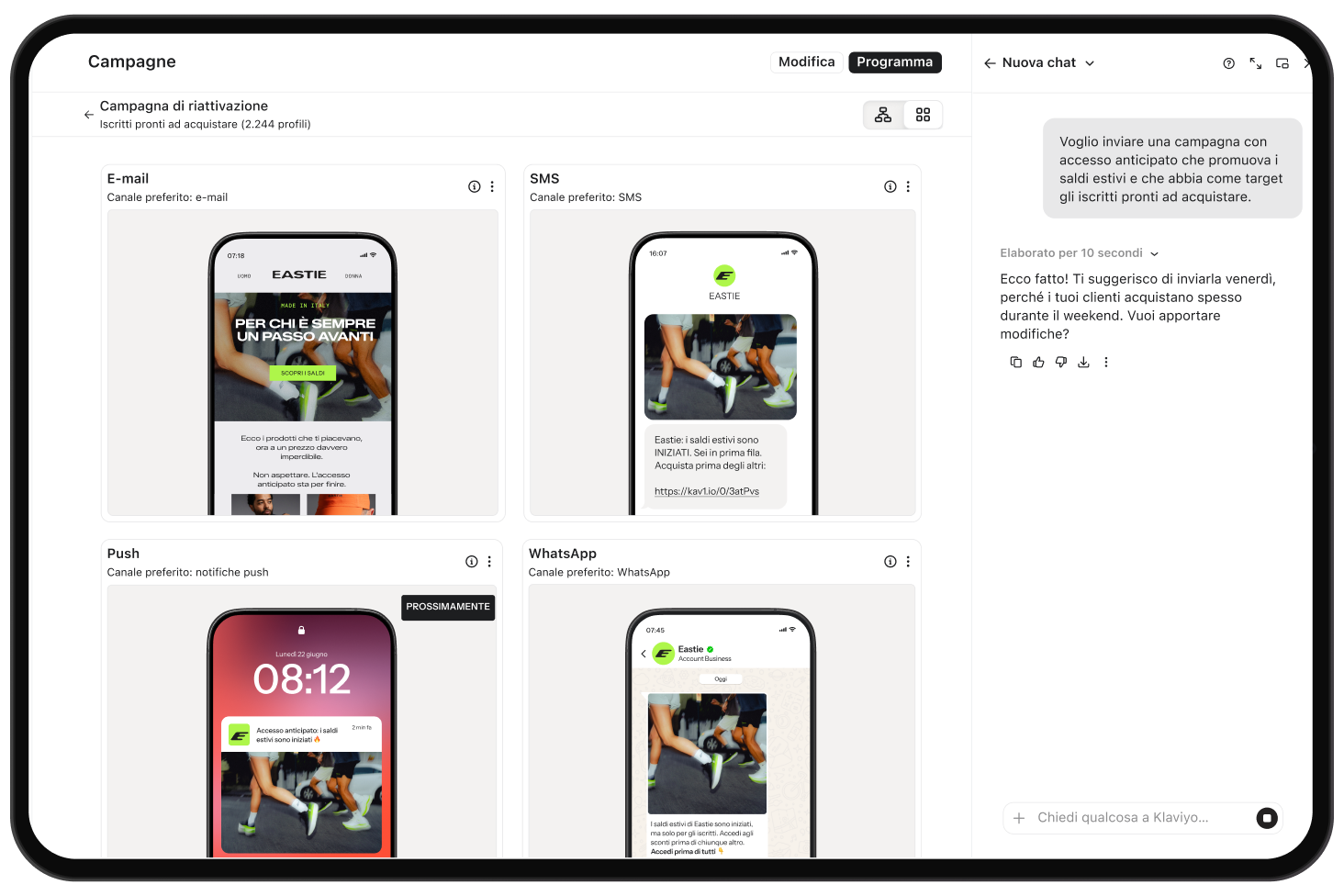 L'editor della campagna che mostra le anteprime di e-mail, SMS, notifiche push e WhatsApp insieme all'assistente IA via chat.