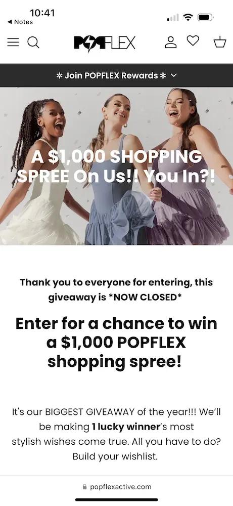 Image shows a landing page on the POPFLEX website for a holiday giveaway shoppers could enter to win a $1,000 shopping spree. Over a photo of 3 models wearing the brand’s dresses and laughing, headline reads, “A $1,000 shopping spree on us! You in?!” Under the image, copy reads, “Thank you to everyone for entering, this giveaway is NOW CLOSED.”
