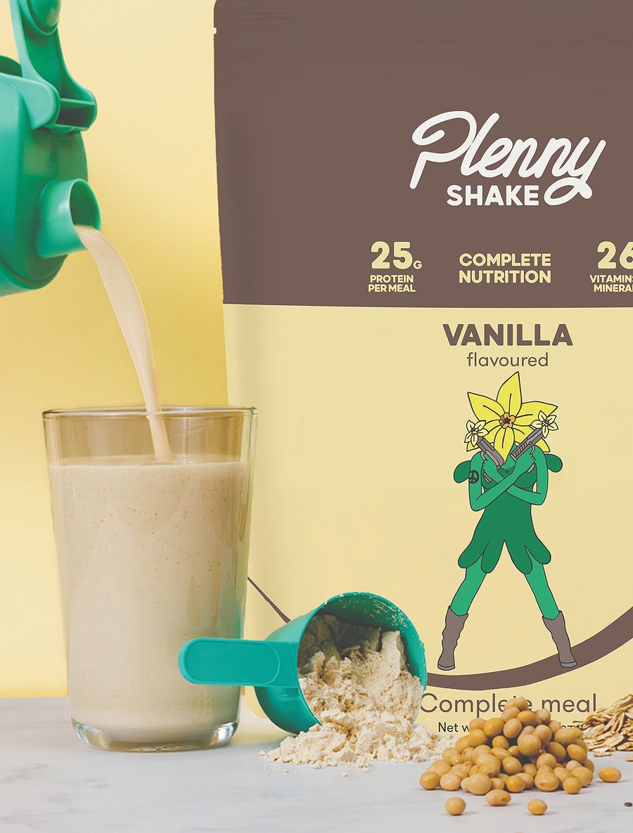 Plenny Shake Vanilla complete nutrition powder bag with a shake being poured into a glass, a scoop of powder, soybeans, and oats.
