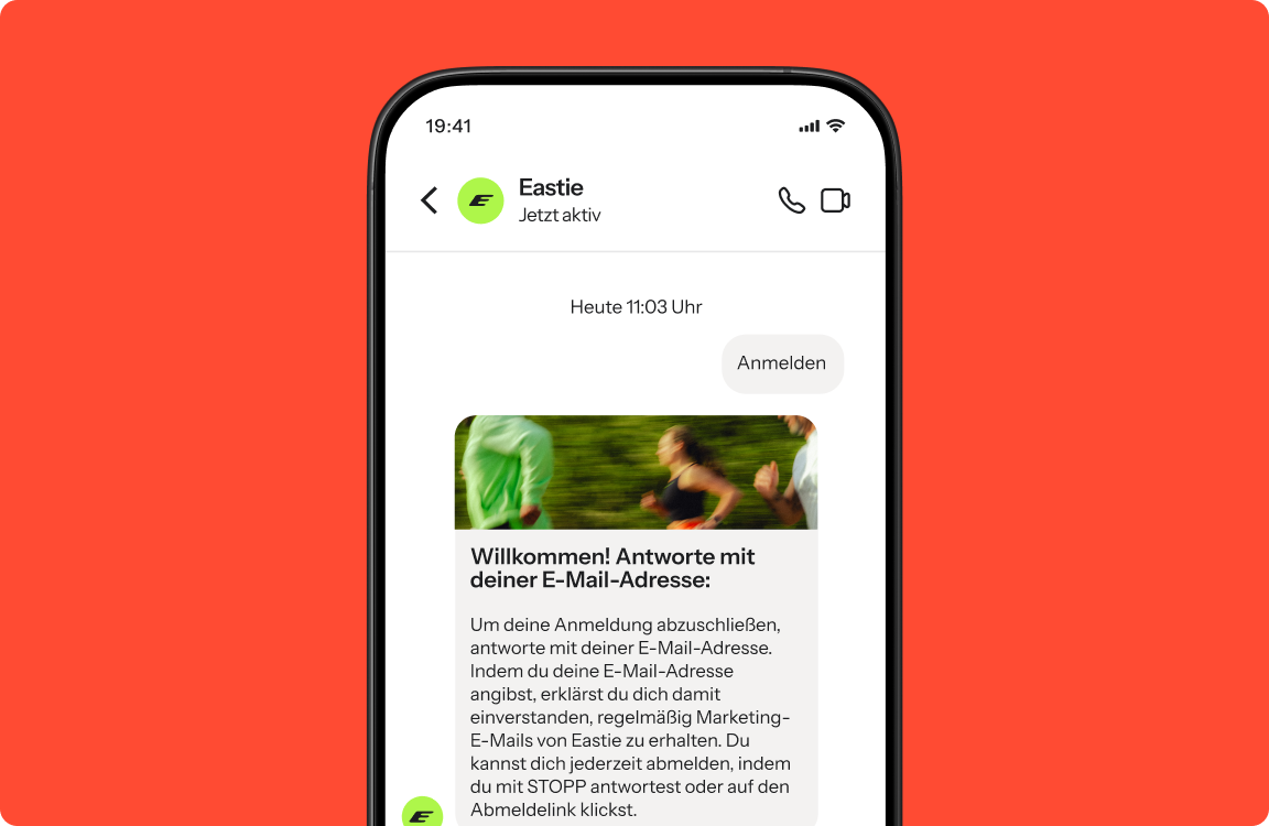 Smartphone displaying an "Eastie" chat with a German welcome message about email registration and an image of two blurred runners.