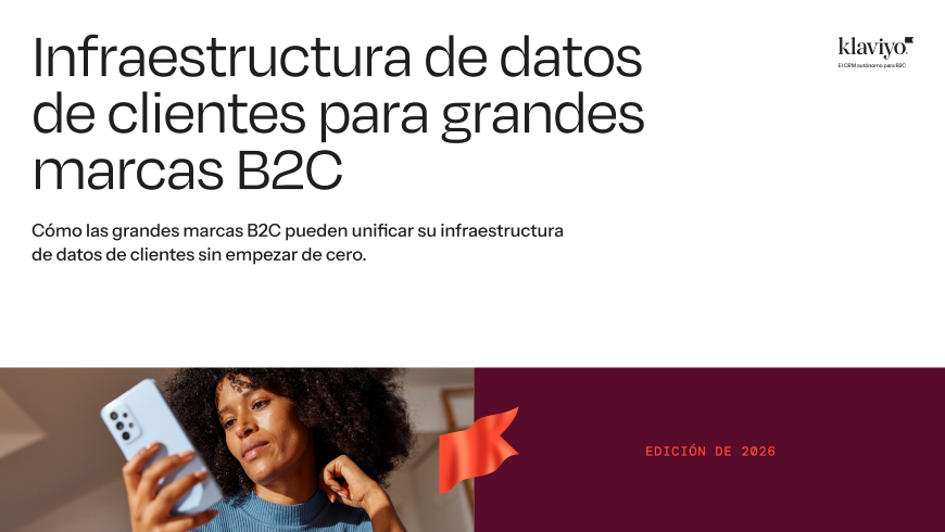 Klaviyo report cover: "Customer data infrastructure for large B2C brands (2026 edition)". Features a woman looking at her phone.