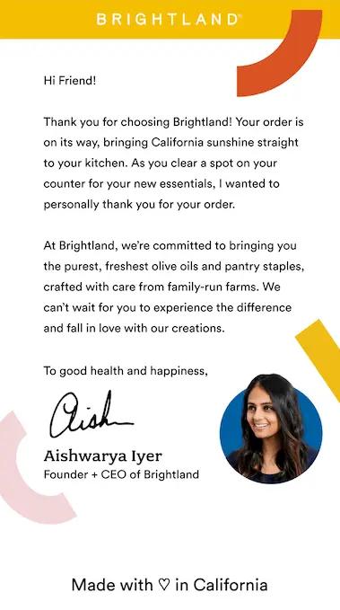 Image shows a simple text-based email against a white background with some orange, red, and pink design motifs as accents. At the bottom of the email is a headshot of a person with tanned skin and long dark hair. The founder signs the email with an image of their handwritten signature.