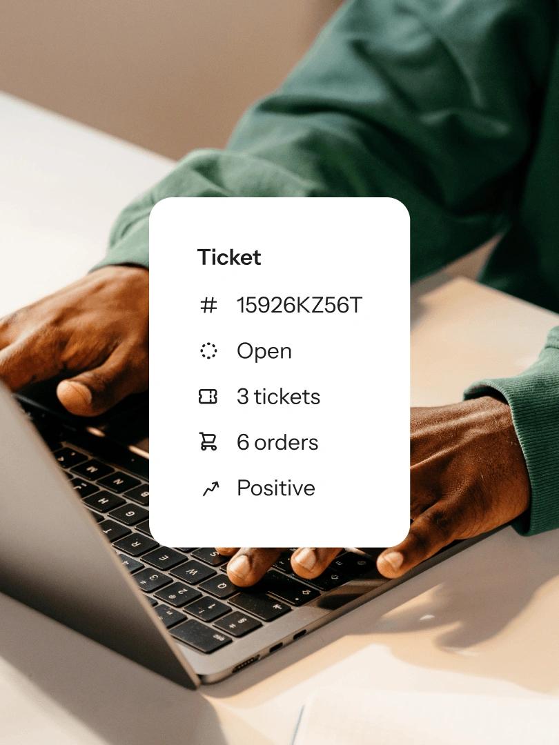 Person typing on a laptop with an overlay showing an open support ticket, three tickets, six orders, and positive status.