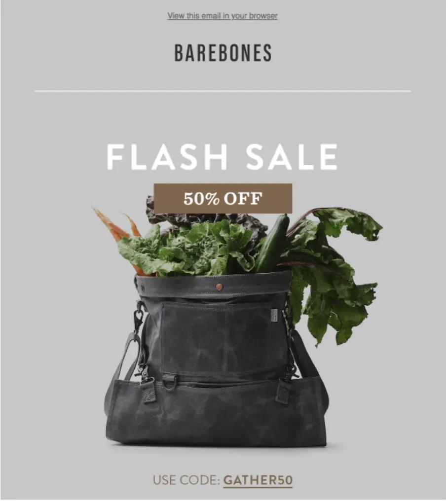 Barebones flash sale ad featuring a black bag with fresh greens, offering 50% off with code GATHER50.