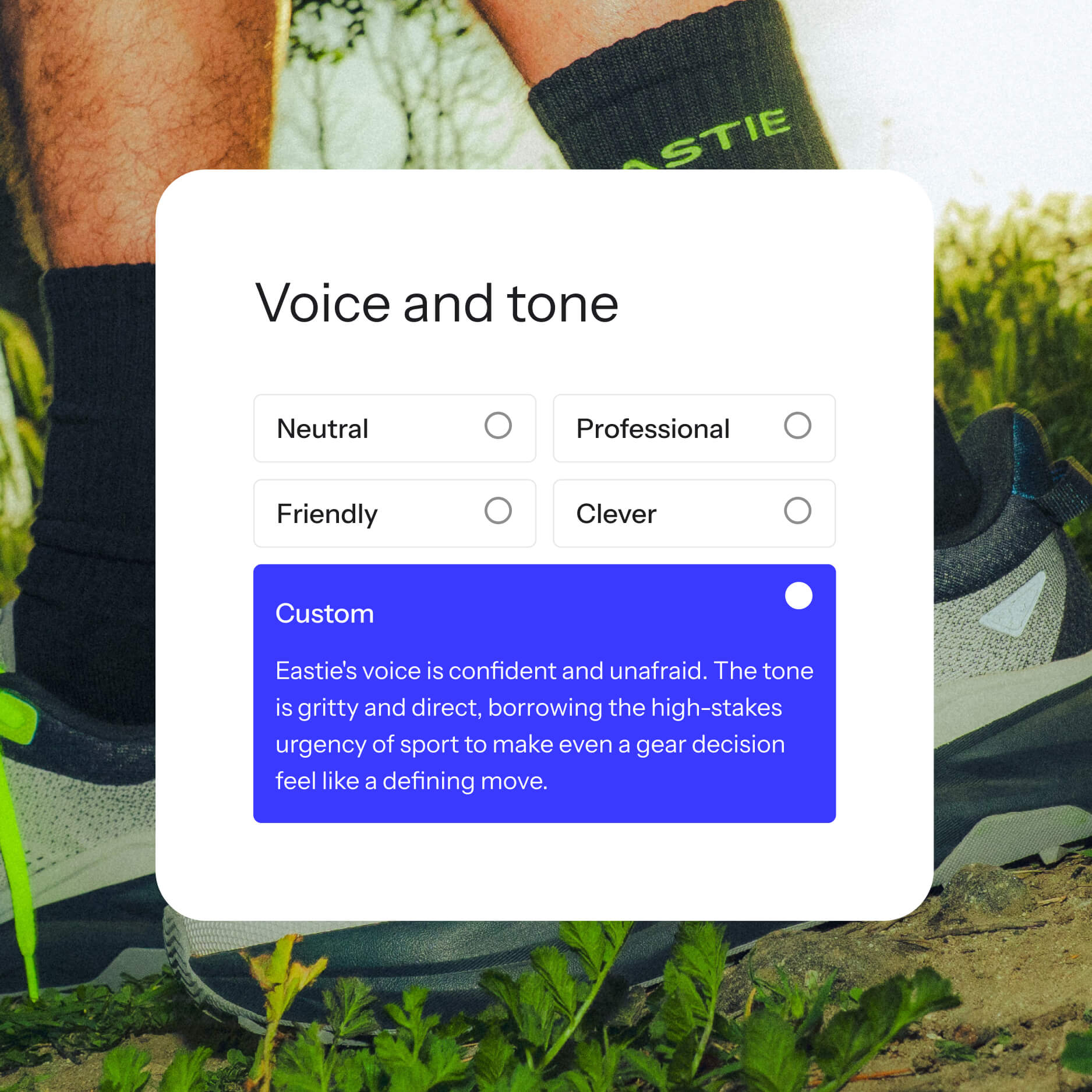 User interface for "Voice and tone" settings, with "Custom" selected and displaying a detailed description of "Eastie's voice and tone," overlaying a blurred background of a person wearing "EASTIE" brand socks and running shoes outdoors.