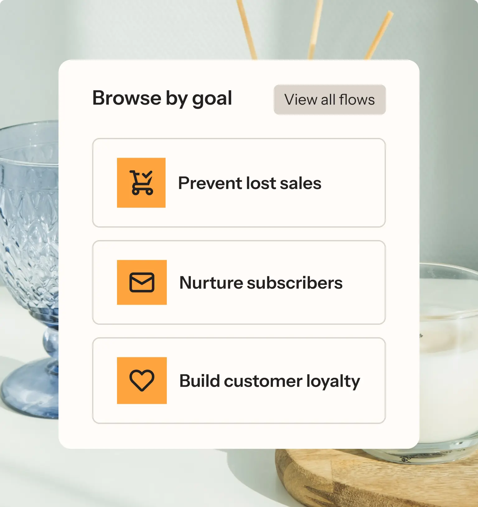 Choosing the type of flow to create in Klaviyo with candles and decor in the background