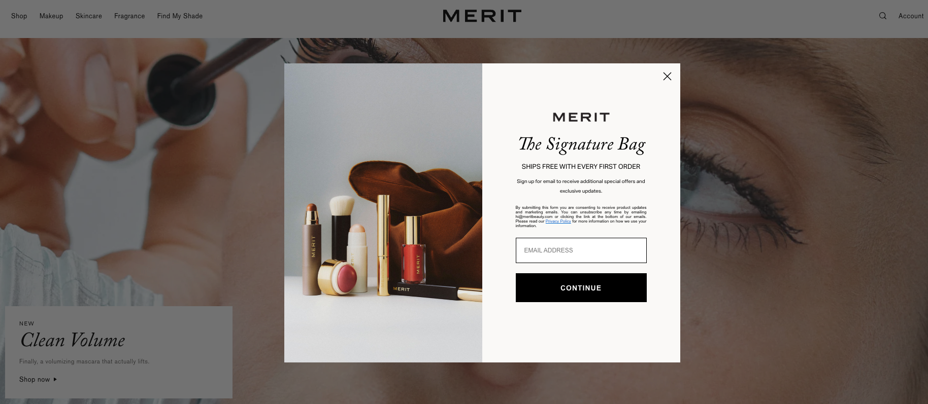 Merit website with a pop-up featuring makeup products and an email signup form for 'The Signature Bag'.