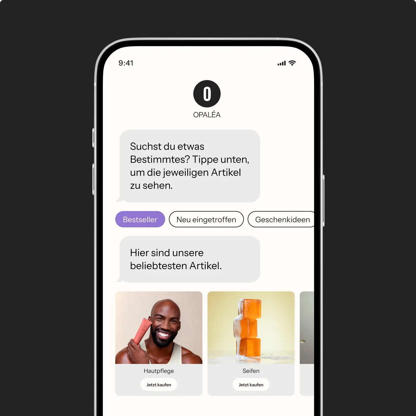 Smartphone-Bildschirm zeigt eine Shopping-App mit Kategorien "Bestseller", "Neu eingetroffen", "Geschenkideen" und Produkten wie Hautpflege und Seifen.