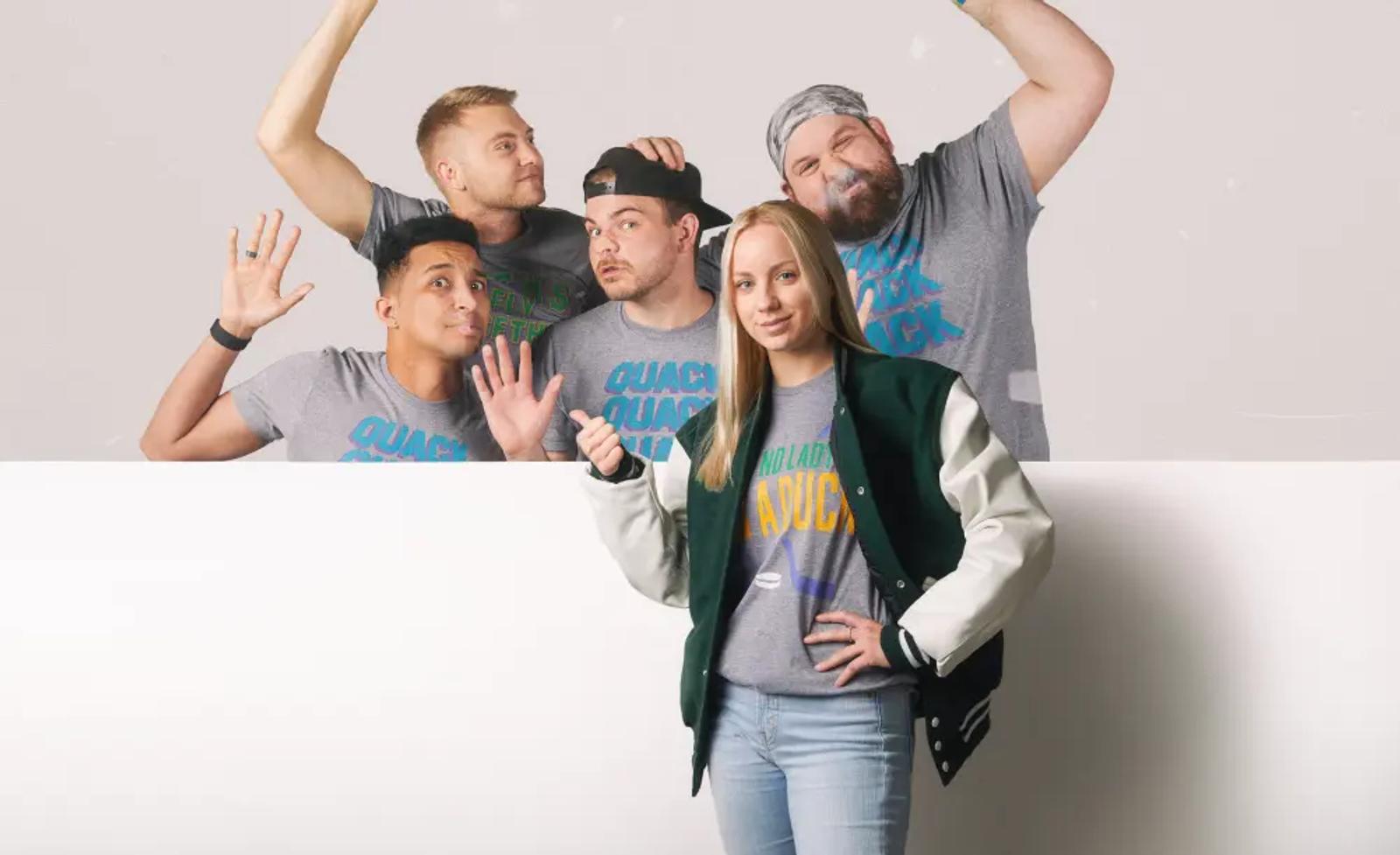 A group of people standing and wearing apparel from HOMAGE.