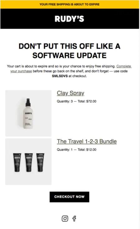 Image shows an abandoned cart email from haircare brand Rudy’s, featuring a headline that reads, “Don’t put this off like a software update.” The email copy reads, “Your cart is about to expire and so is your chance to enjoy free shipping. Complete your purchase before these go back on the shelf.” There are images of the products the subscriber left behind, including a white spray bottle of clay spray and 3 black tubes of hair product, with a link to each one, and a CTA button at the bottom that reads, “Checkout now.”