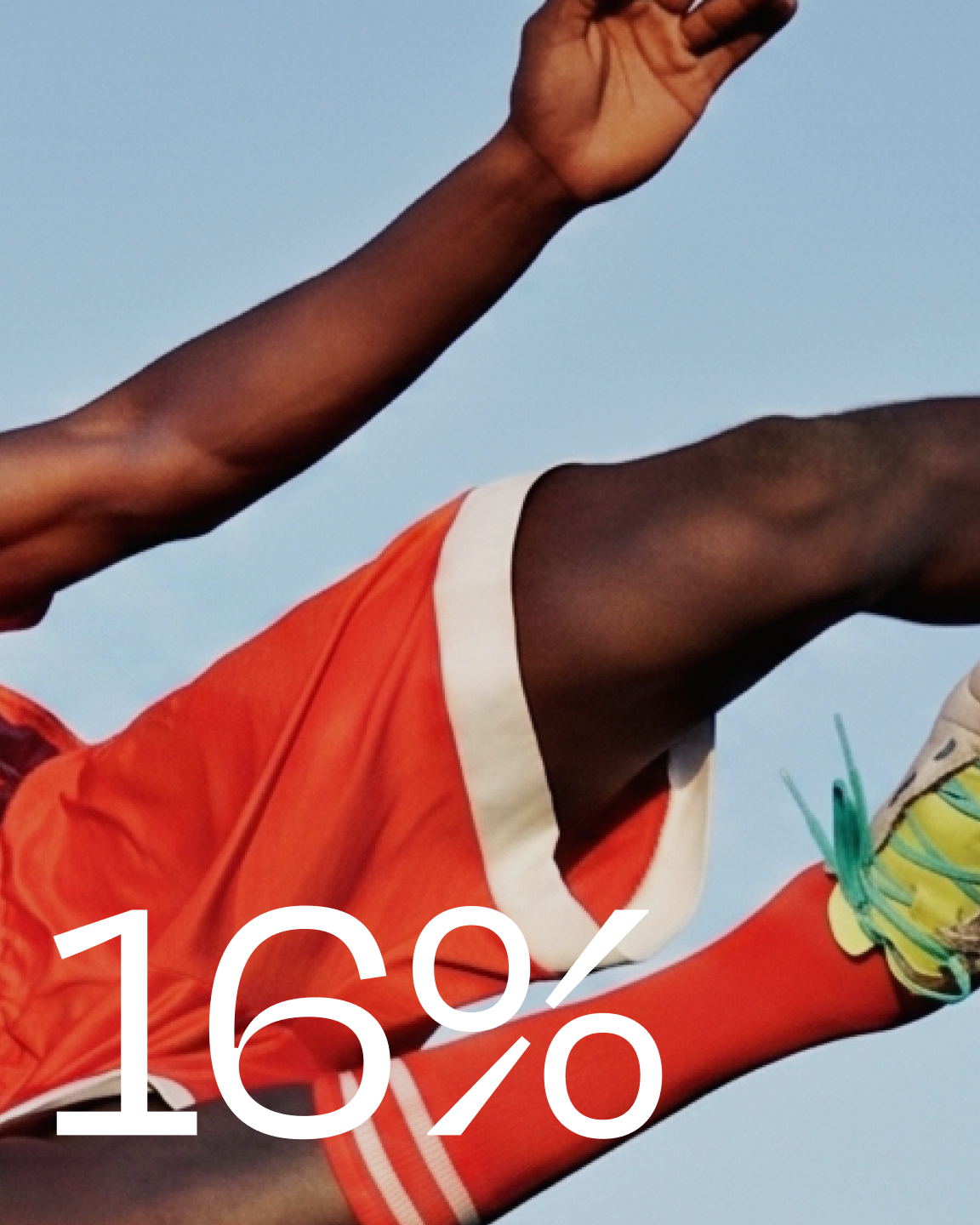 Person in orange athletic wear mid-jump against a blue sky, with '16%' overlaid.