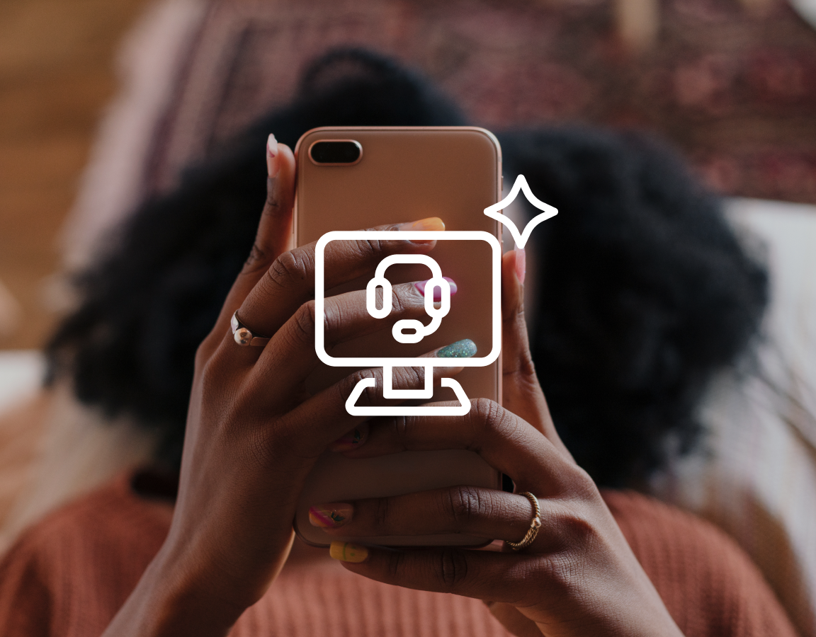 A photograph of a woman using her phone.