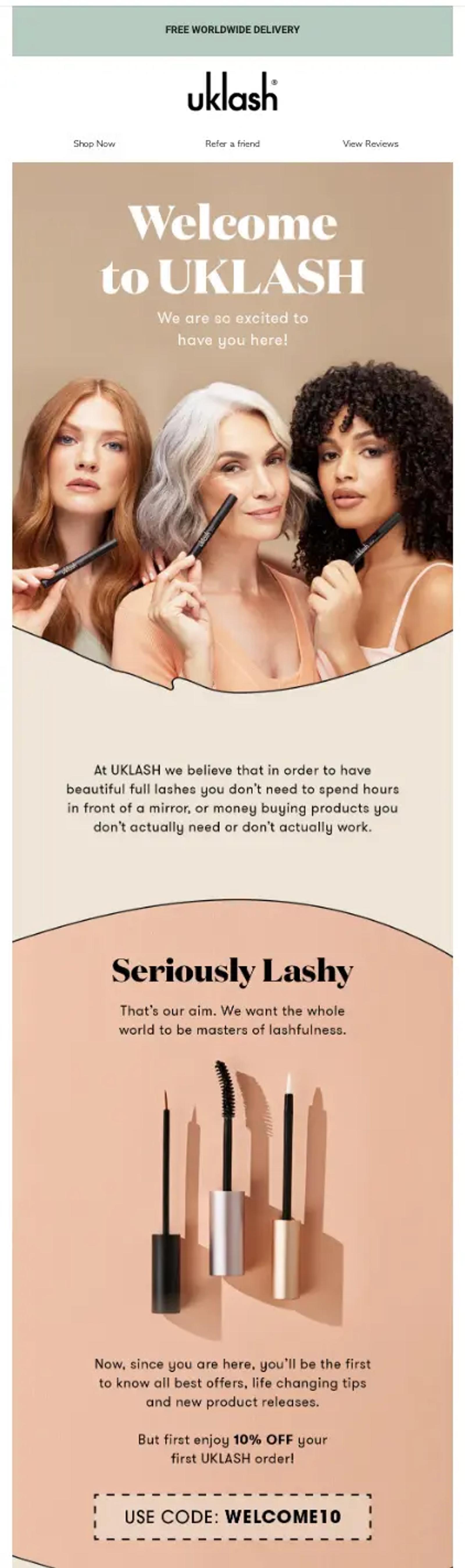 Image shows a welcome email from UKLASH with warm, earthy colors that reads, “Welcome to UKLASH. We are so excited to have you here!” The first image in the email shows three models holding mascara and smiling. Below the image, body copy reads, “At UKLASH we believe that in order to have beautiful full lashes you don’t need to spend hours in front of a mirror, or money buying products you don’t actually need or don’t actually work.” The bottom half of the email includes a product image and a welcome discount code.