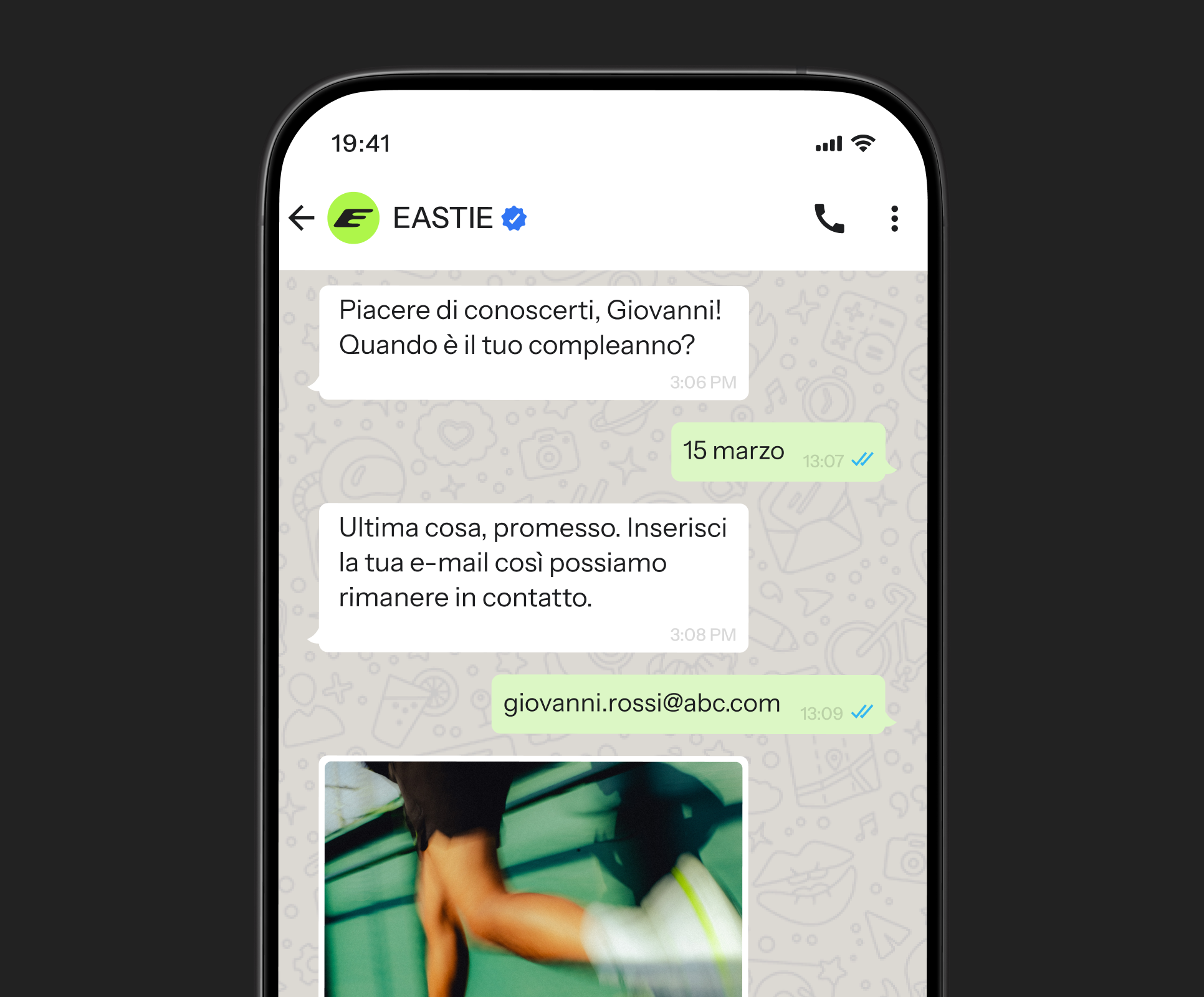 A smartphone displays a WhatsApp chat with the verified account "EASTIE", showing messages about a birthday and email, and a partial image of a person's leg.